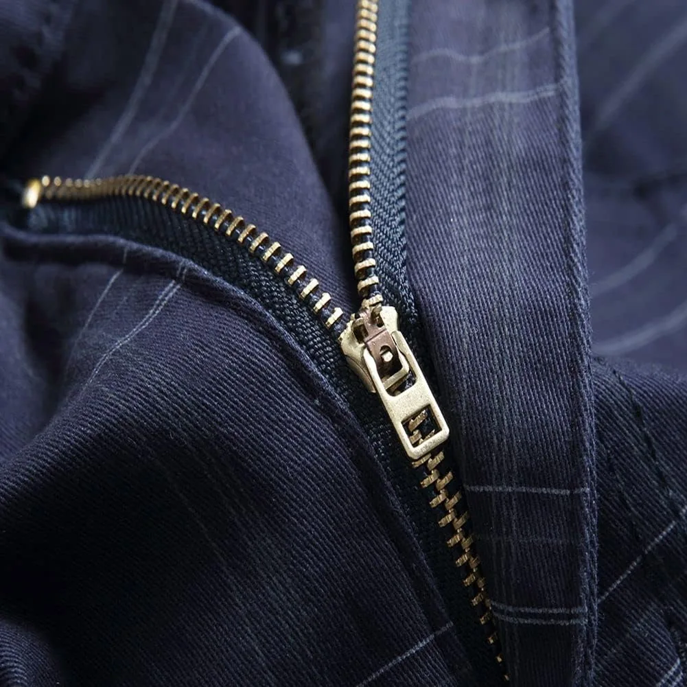Close-up of navy plaid chinos with a metal zip fly