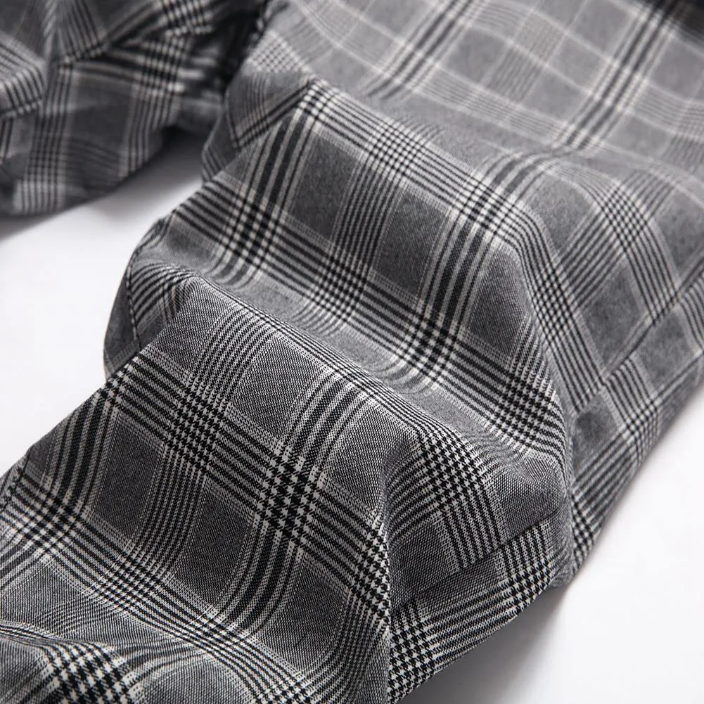 Grey plaid fabric of a pair of stretch chinos in close-up